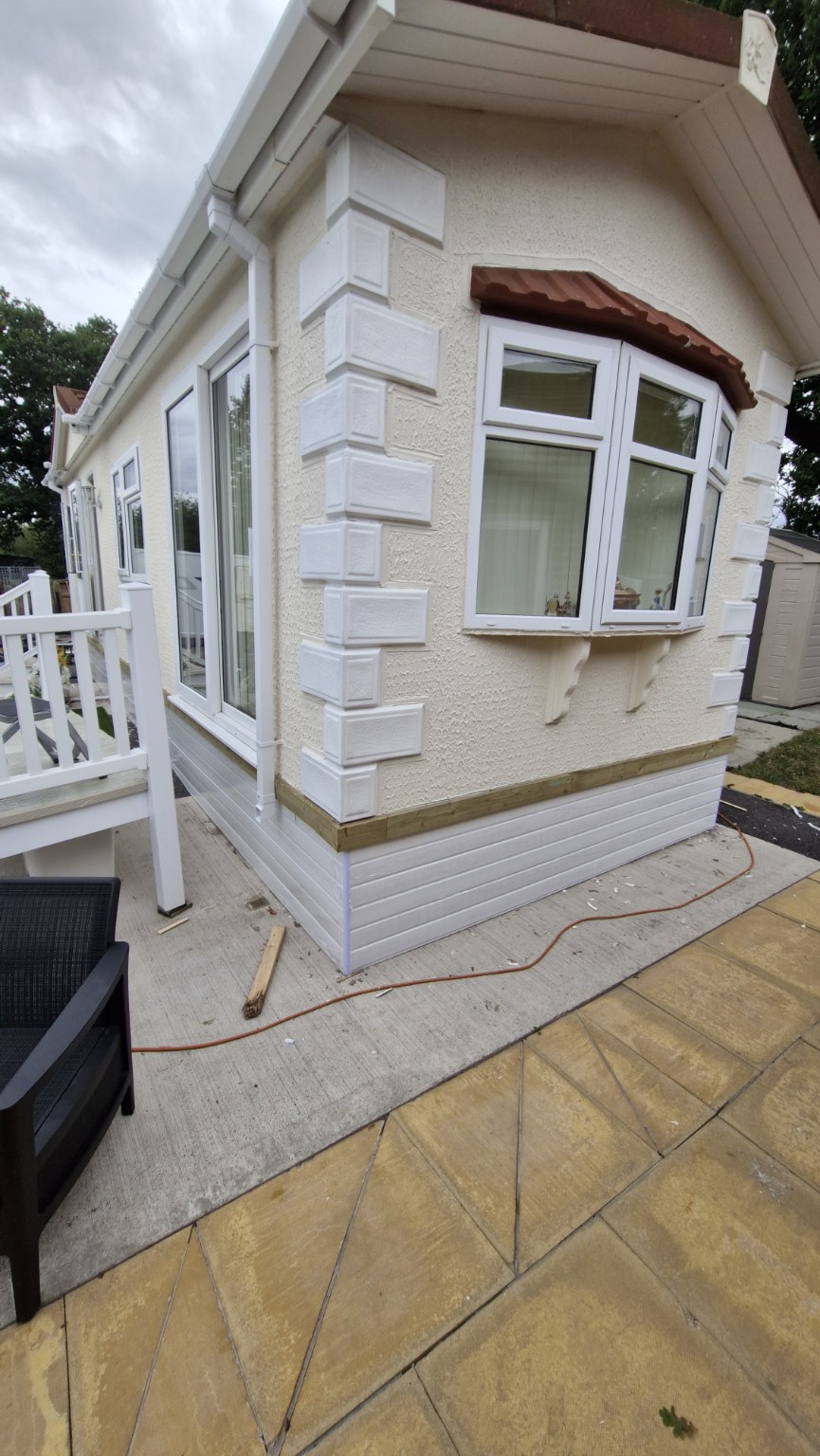 Completed corner with white lower cladding